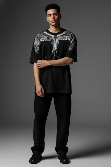 Male model wearing Black Spirit Wings oversized tshirt India – dark streetwear aesthetic – PopCase 2026