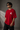CHAL brand red oversized t-shirt with white graphic print of dice and text. Model wearing the t-shirt to showcase the relaxed, oversized fit.