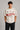 Beige oversized t-shirt with large red and black HOT WHEELS 'Original Since 1968' graphic print on the front, showcasing premium fabric texture. - beige