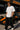 Model wearing white POPCASE Oscar Piastri McLaren oversized t shirt with orange McLaren speed mark logo and McLaren race car back graphic