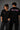 Black POPCASE oversized tshirt with Bad Intentions Only pink gothic text and tribal sun print on back, worn with black cargo pants