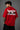 Red POPCASE oversized tshirt with Keep Pushing flaming F1 tire on front and Formula One is my love language vintage McLaren race car graphic on back
