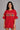 Person wearing a red 'Friends' t-shirt with character illustrations on a gray background