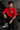 Red oversized t-shirt with 'PROJECTOR HANUMANJI' graphic design of a warrior monkey god and 'POPCASE' logo, worn by a man.