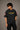 Model wearing a vintage wash dark blue oversized t-shirt with a graphic of Cristiano Ronaldo on the back and "CRISTIANO RONALDO" text on the front.