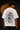 Red oversized t-shirt featuring a bold, blue and orange graphic of Ashwathama's eyes with "The Cursed Warrior" text. Model wearing the t-shirt.