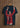 T-shirt with a printed design of a person in a red jersey on a wooden background