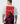 Person wearing a t-shirt with a graphic design and text on the back