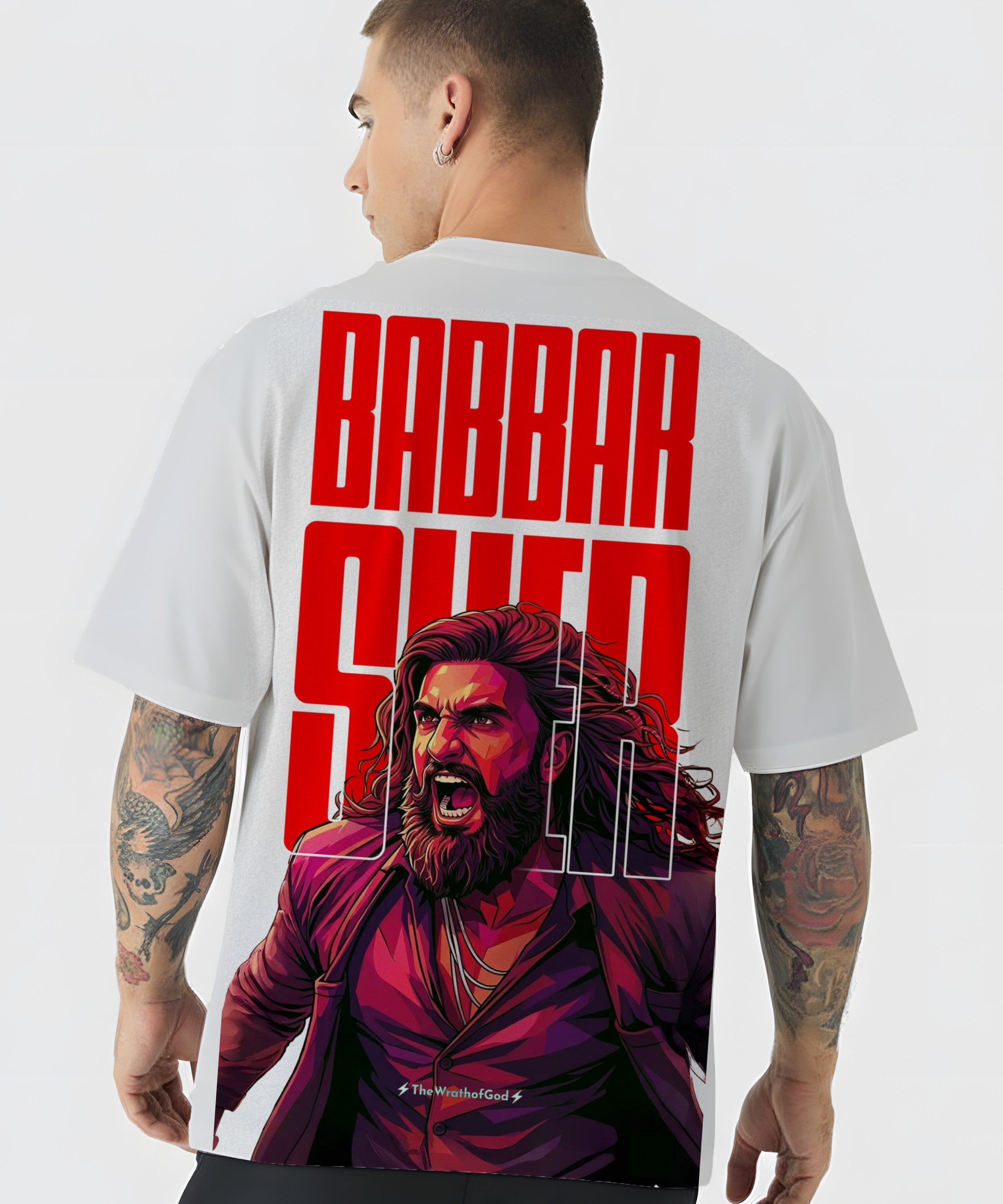 Person wearing a t-shirt with a graphic design and text on the back