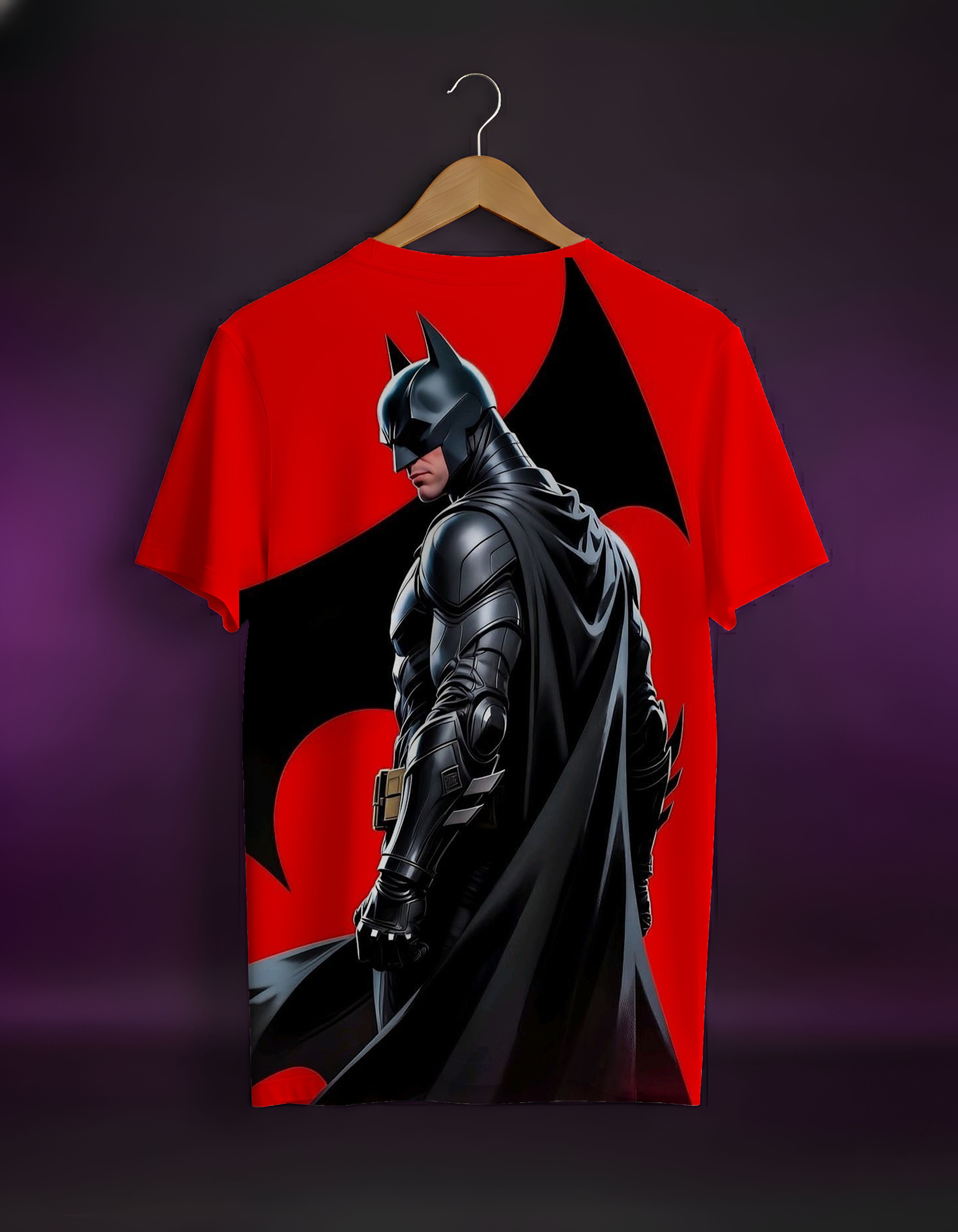 Red t-shirt with a graphic of a superhero in black on a hanger against a dark background