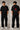 Man wearing a white oversized t-shirt with a large red Ace of Hearts graphic and 'pretty lucky' text on the back. Streetwear fashion. - black