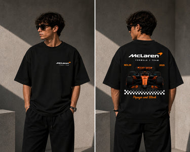 McLaren Formula 1 '2025 MCL39' design on a white oversized t-shirt, featuring a graphic of the F1 car on a checkered flag. Showcasing premium cotton fabric. - black