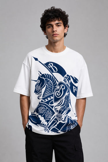 Man wearing a black kuwansugg DESIGN oversized t-shirt with a white graphic print of a knight on a horse. The t-shirt is made of premium cotton.