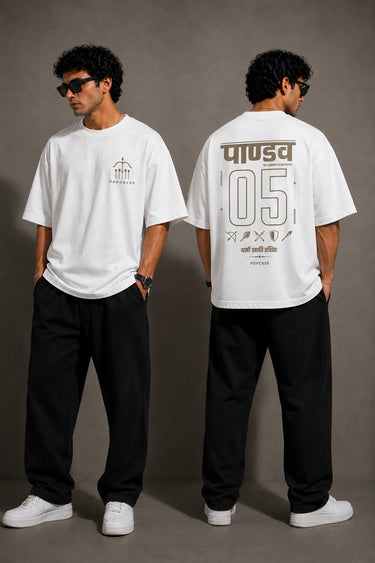 Model wearing a beige POPCASE 5 Pandav oversized t-shirt featuring a large graphic of 'Pandav' in Hindi, '05', and warrior icons. Premium streetwear. - white