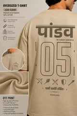 Model wearing a beige POPCASE 5 Pandav oversized t-shirt featuring a large graphic of 'Pandav' in Hindi, '05', and warrior icons. Premium streetwear.