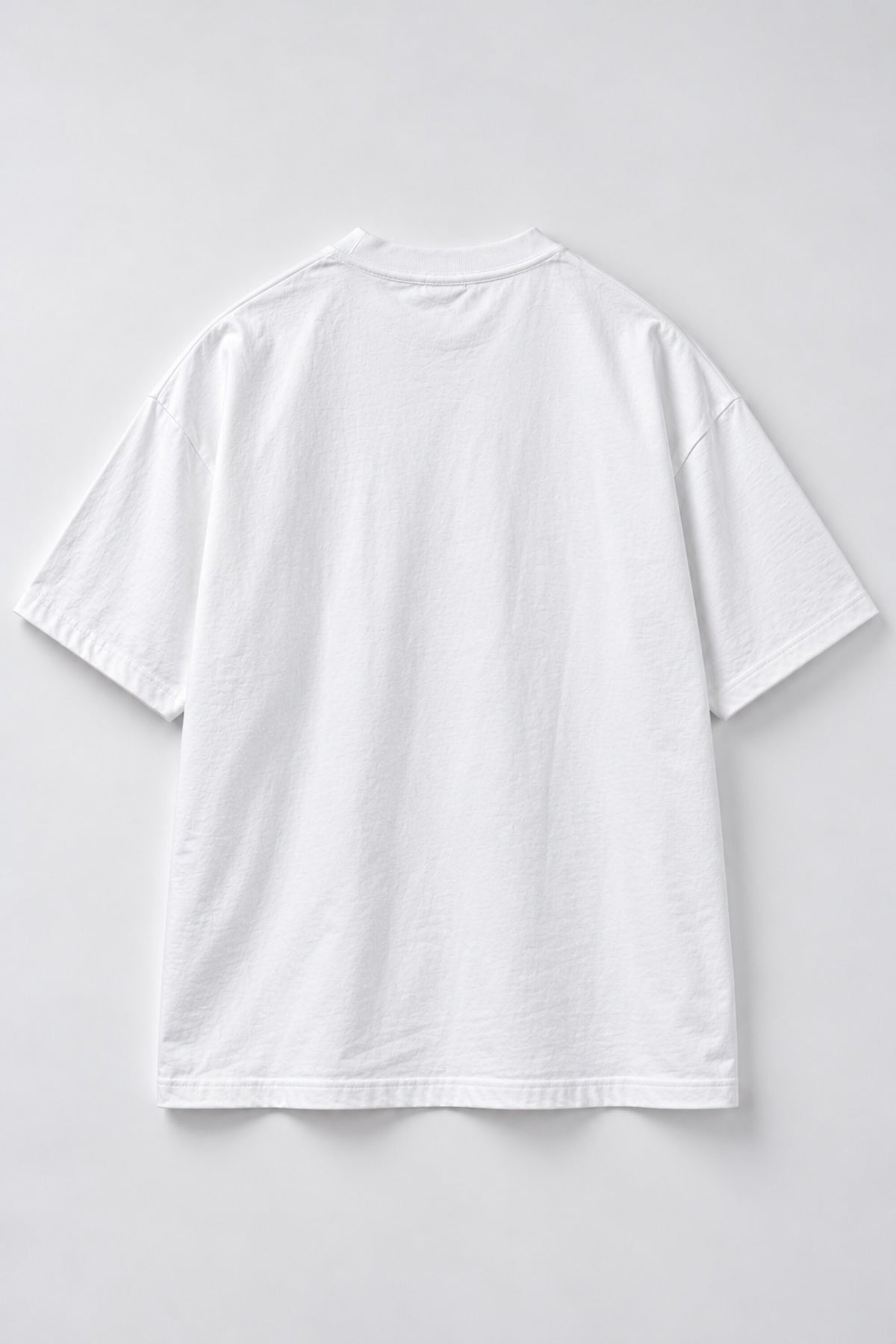 White oversized tshirt with red graffiti Ain't It text on chest and surreal pop art illustration below, drop shoulder boxy fit, men India
