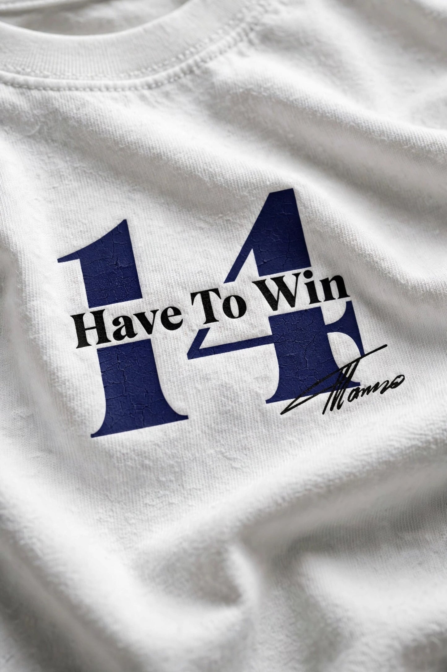 Model wearing white POPCASE Fernando Alonso oversized t shirt with navy blue crackled Have To Win 14 design and Alonso signature