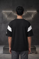 Black oversized tshirt with white Batman logo on chest and white wing panel sleeve details, drop shoulder boxy fit, men India
