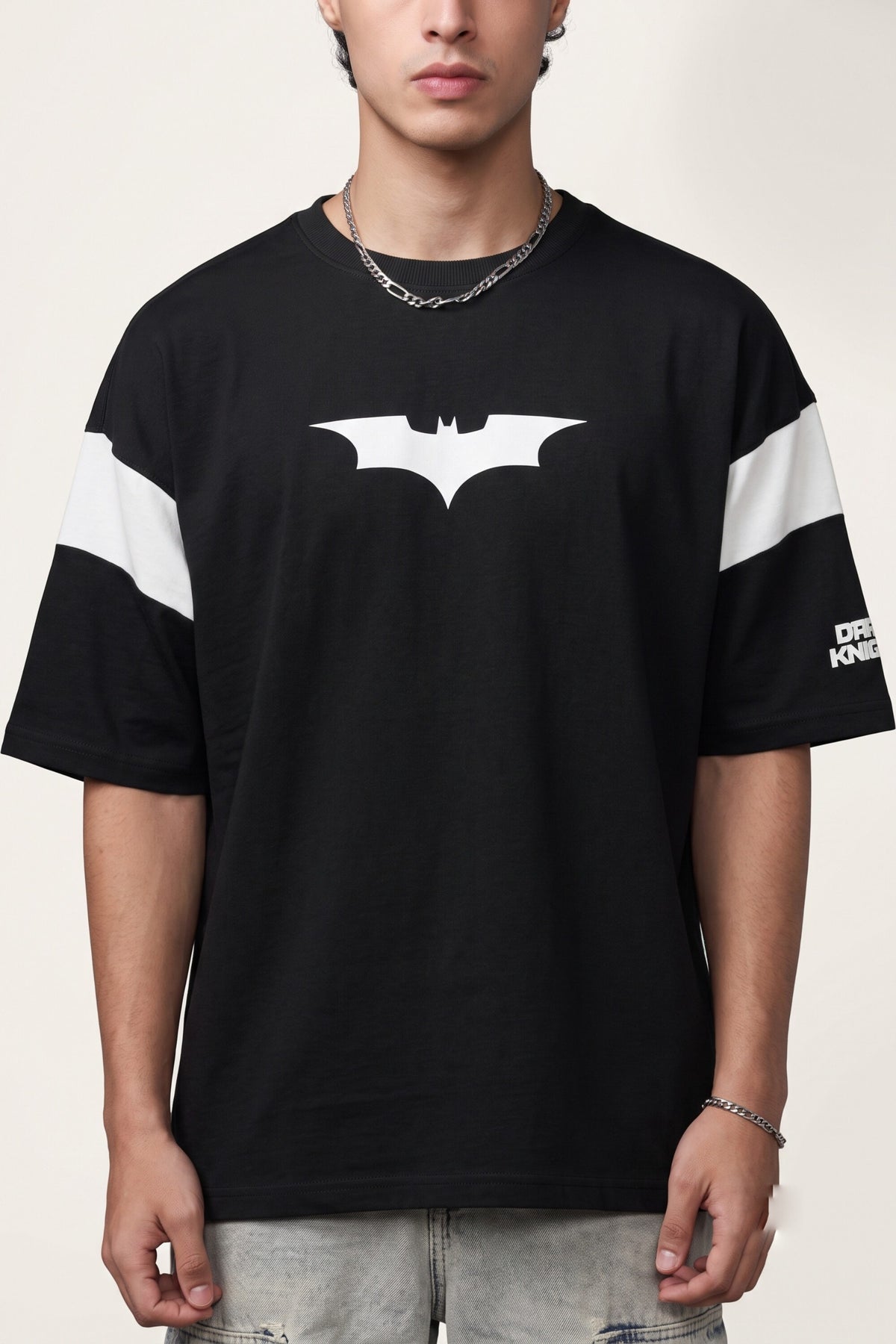Black oversized tshirt with white Batman logo on chest and white wing panel sleeve details, drop shoulder boxy fit, men India
