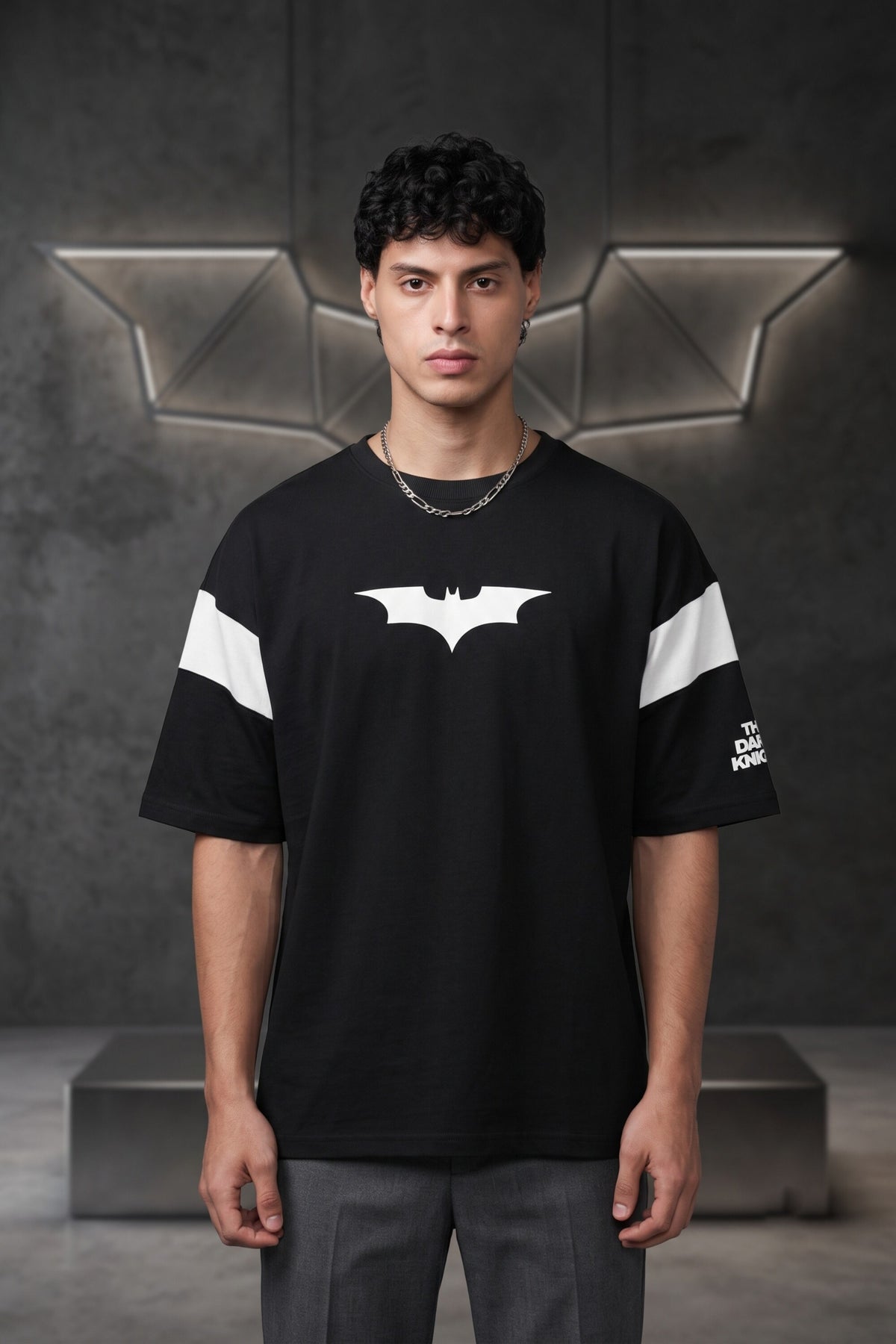 Black oversized tshirt with white Batman logo on chest and white wing panel sleeve details, drop shoulder boxy fit, men India