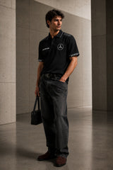 Black Mercedes-Benz AMG polo t-shirt with star logo, AMG branding and dark racing shoulder panel, motorsport India