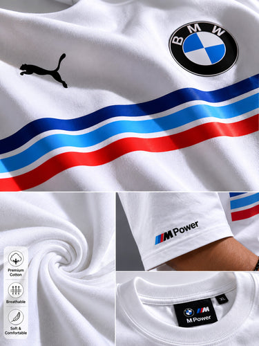 Man wearing a white BMW oversized t-shirt with blue, light blue, and red stripes across the chest and a black Puma logo and BMW M Motorsport emblem.