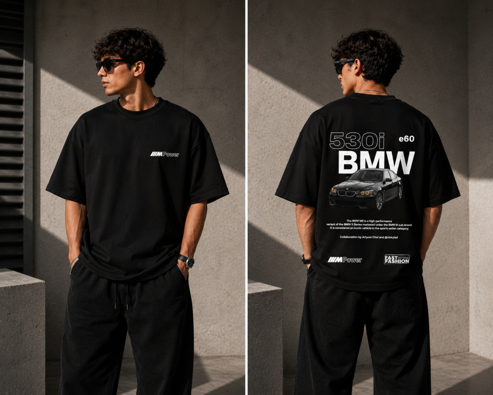 Man wearing a white oversized BMW M "530i E60" graphic t-shirt and black baggy jeans, standing against a textured concrete wall. - black
