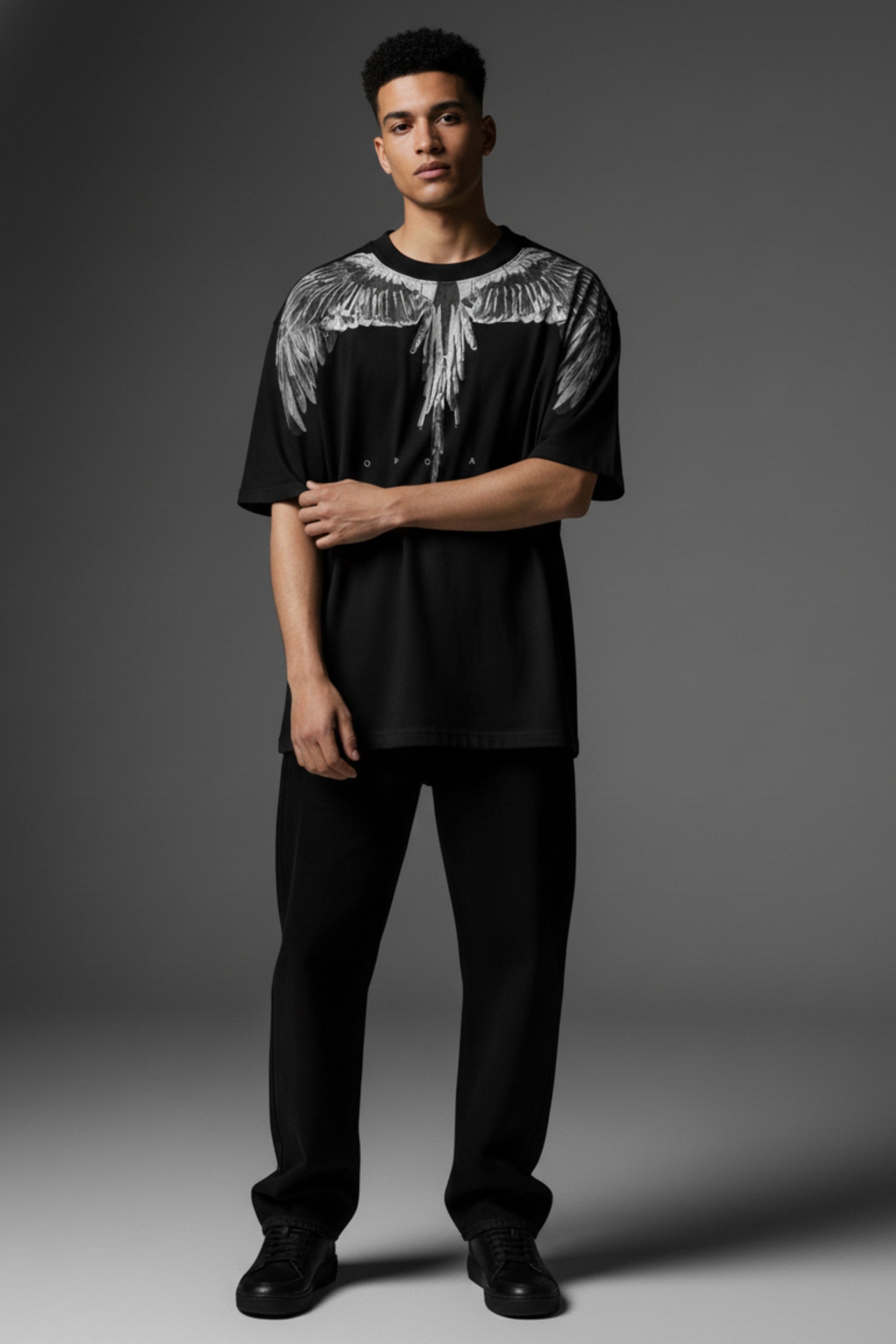 Male model wearing Black Spirit Wings oversized tshirt India – dark streetwear aesthetic – PopCase 2026