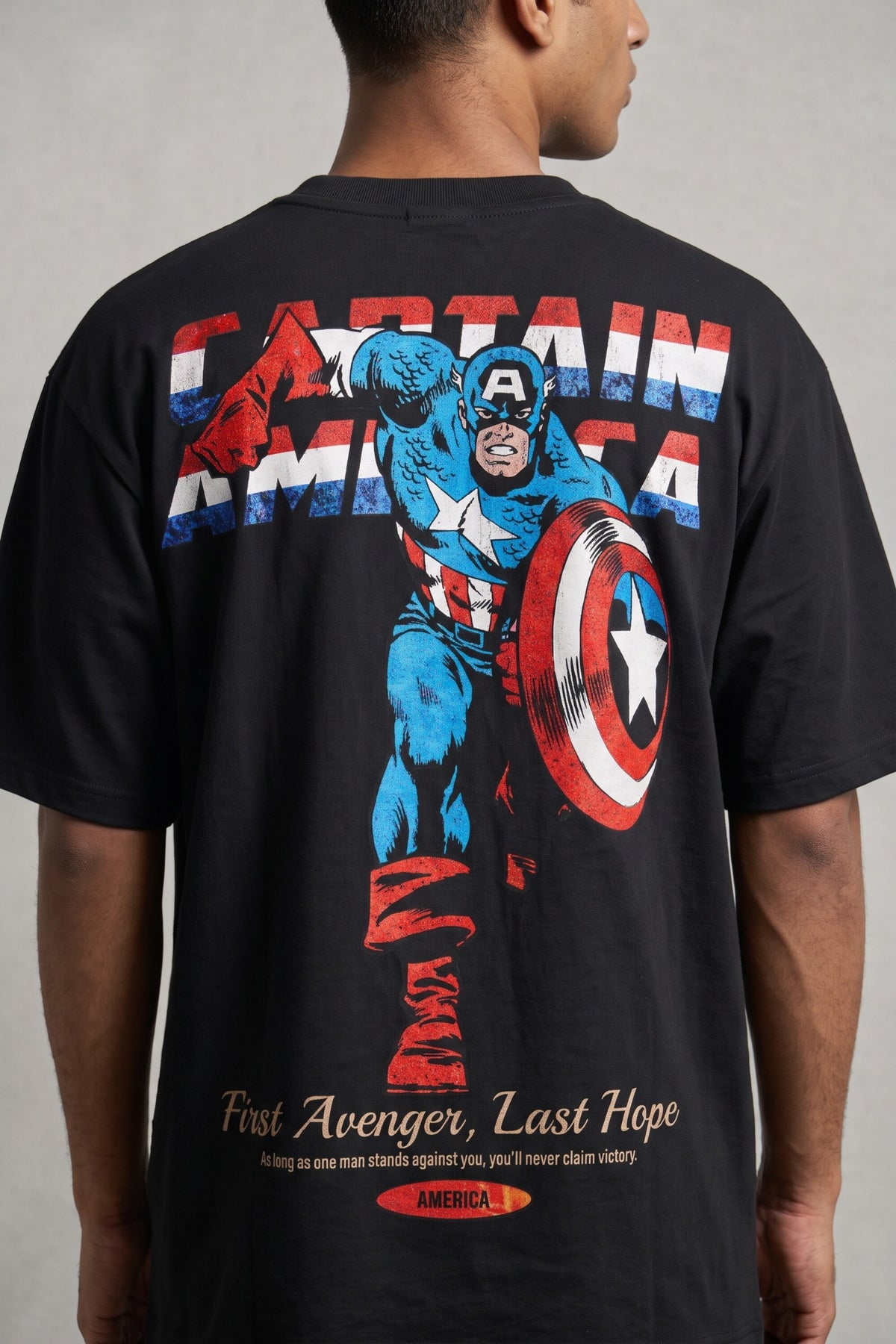 Black oversized tshirt with classic Captain America comic art in red white blue and First Avenger Last Hope text on back, men India