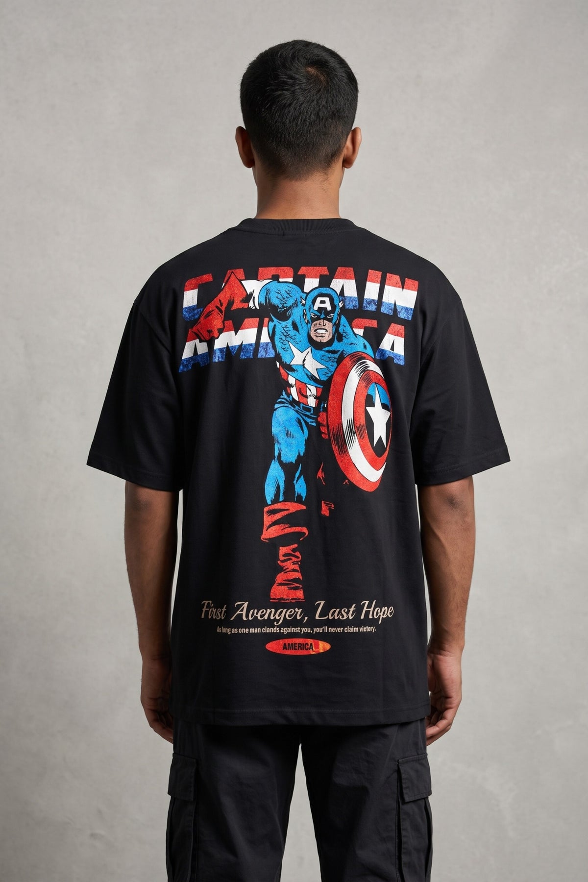 Black oversized tshirt with classic Captain America comic art in red white blue and First Avenger Last Hope text on back, men India