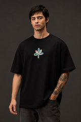 POPCASE Chaos black oversized t shirt with multicolour graffiti CHAOS back print and abstract flower front graphic streetwear