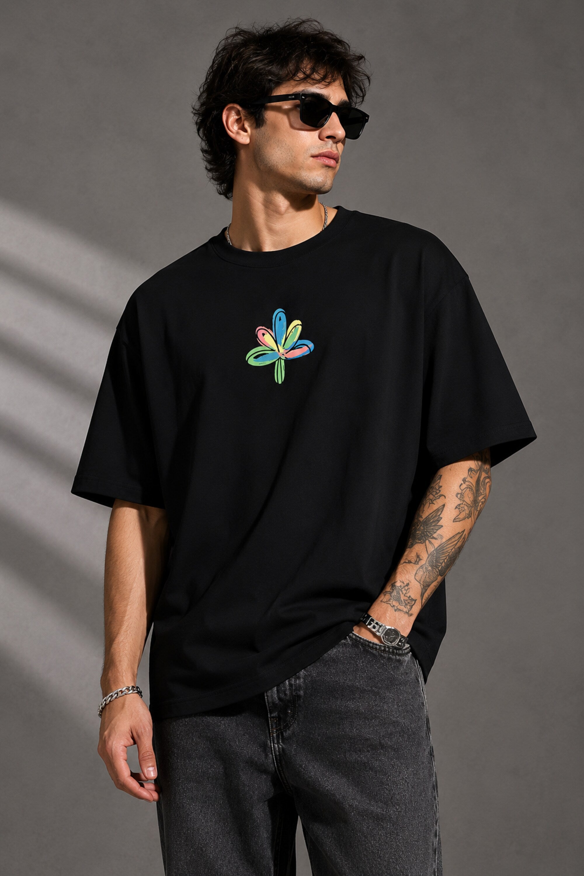 POPCASE Chaos black oversized t shirt with multicolour graffiti CHAOS back print and abstract flower front graphic streetwear