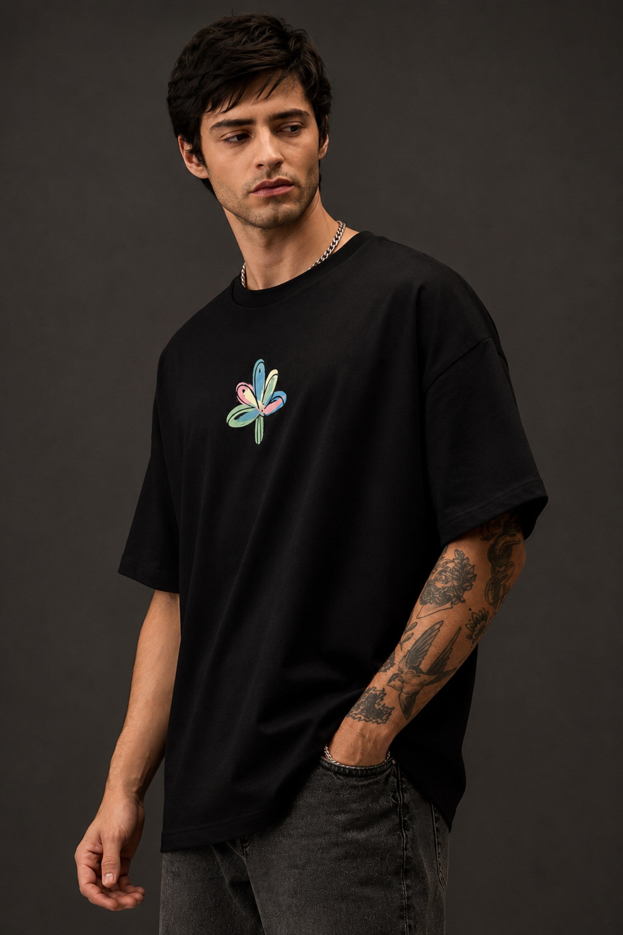 POPCASE Chaos black oversized t shirt with multicolour graffiti CHAOS back print and abstract flower front graphic streetwear