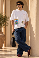 White oversized tshirt with vibrant pop art dual panel cartoon and fashion figures illustration on chest, drop shoulder boxy fit, men India