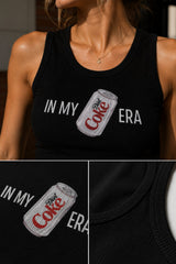 Black ribbed racerback tank top with IN MY DIET COKE ERA text and illustrated Diet Coke can graphic trendy Gen Z statement women top