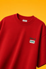Red oversized t-shirt with Ctrl+Z shortcut print in teal green on left chest, quirky streetwear India