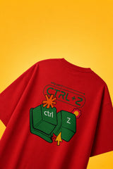 Red oversized t-shirt with Ctrl+Z shortcut print in teal green on left chest, quirky streetwear India