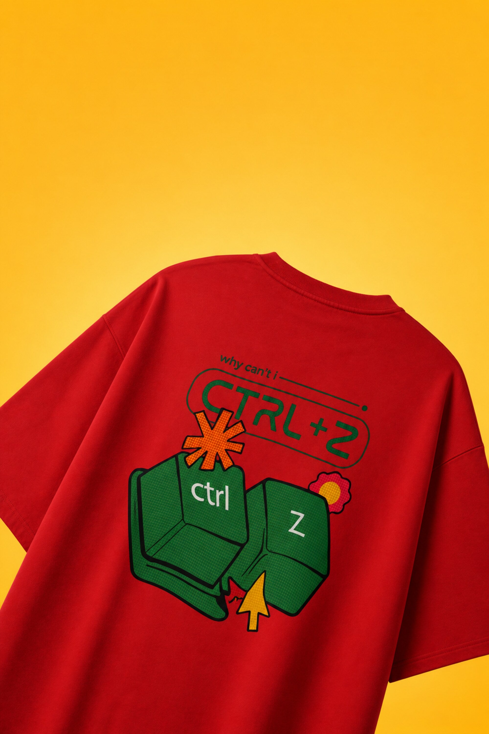 Red oversized t-shirt with Ctrl+Z shortcut print in teal green on left chest, quirky streetwear India
