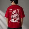 CHAL brand red oversized t-shirt with white graphic print of dice and text. Model wearing the t-shirt to showcase the relaxed, oversized fit.