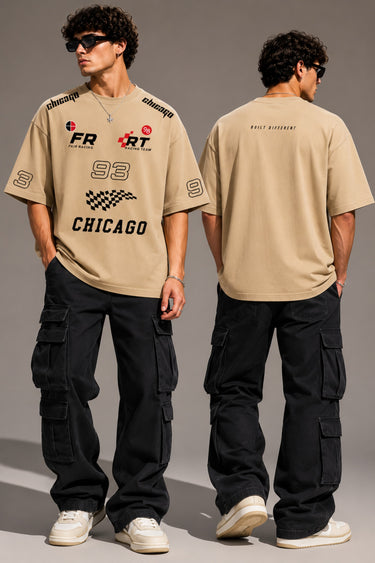 Black oversized t-shirt with 'Chicago' graphic print and racing-inspired logos. Offers premium streetwear style. - beige