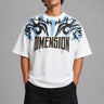 Model wearing a white DIMENSION oversized t-shirt with a black and blue graphic print and a silver chain necklace. - white