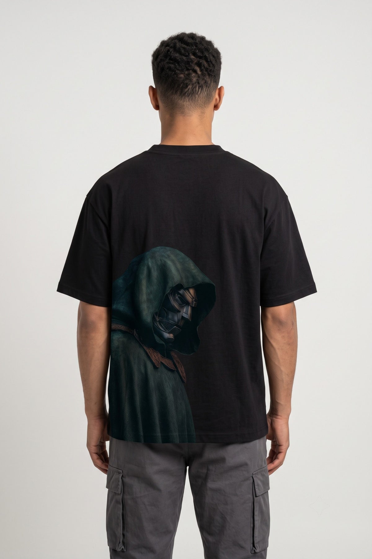 Black oversized tshirt with DOOM green text on front and hooded skull villain back print, drop shoulder boxy fit, men India