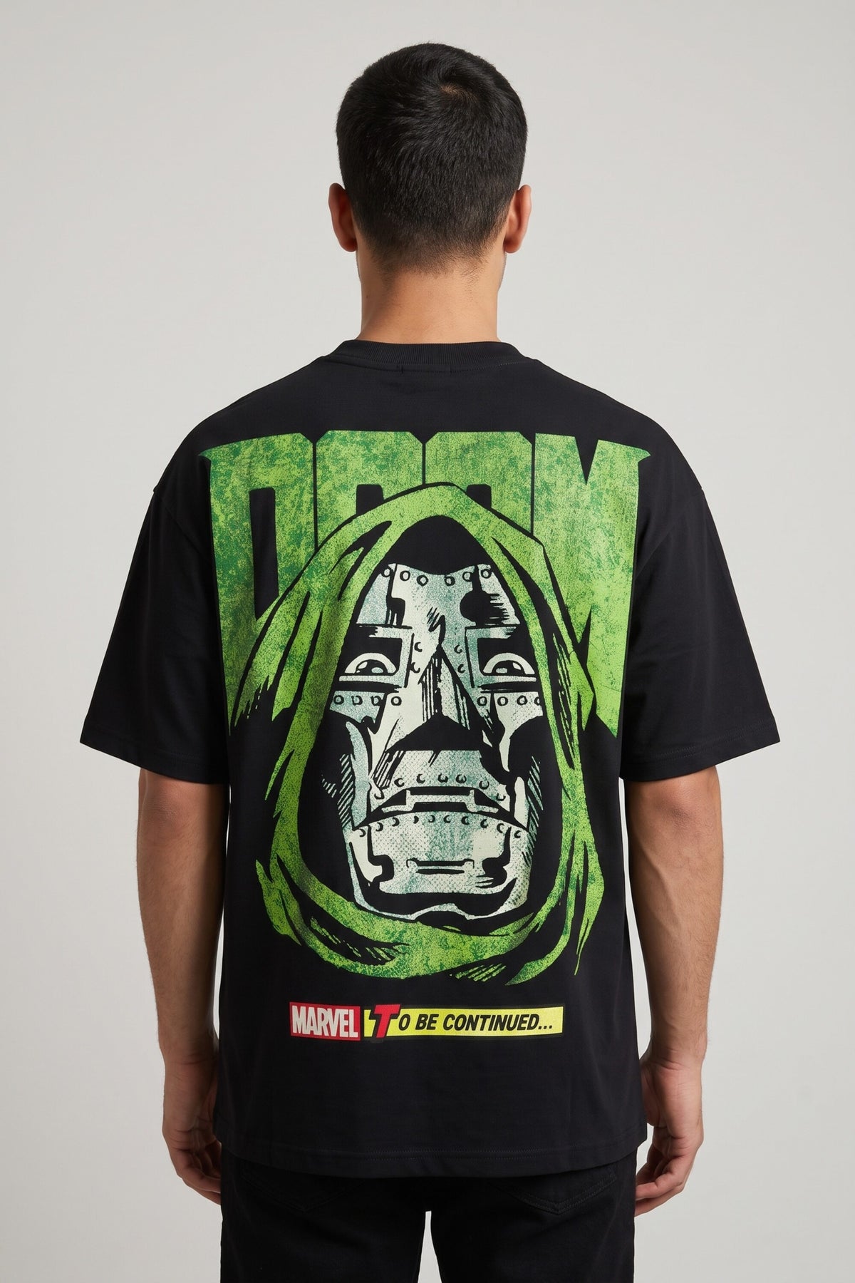 Black oversized tshirt with bold green DOOM text and Dr Doom metallic mask face on back, drop shoulder boxy fit, men India - doom design shot 4