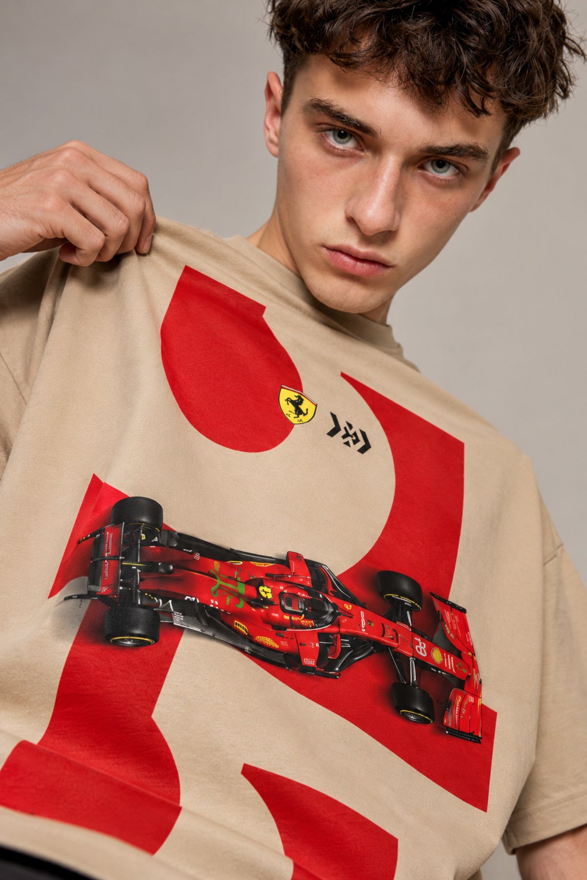 Beige oversized tshirt with bold red 16 number Ferrari prancing horse and red F1 racing car print on front, drop shoulder boxy fit, men India