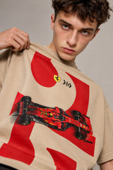 Beige oversized tshirt with bold red 16 number Ferrari prancing horse and red F1 racing car print on front, drop shoulder boxy fit, men India