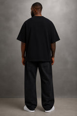 Black oversized t-shirt with large white outline flame design on front, streetwear fashion India
