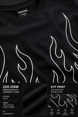 Black oversized t-shirt with large white outline flame design on front, streetwear fashion India