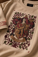 Beige Harry Potter oversized tshirt with Gryffindor house crest floral tapestry HD print and red printed sleeve bands