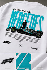 Model wearing white POPCASE George Russell Mercedes oversized t shirt with star logo on chest and teal MERCEDES race car back graphic