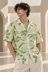 Off-white Hawaiian shirt with bold green and yellow botanical leaf art print, Cuban collar, relaxed fit, men India